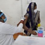 India launches effort to inoculate all adults against COVID